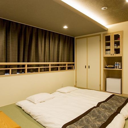 東心斎橋おおきにアパート Ookini Ryokan & Apartment โอซาก้า ภายนอก รูปภาพ
