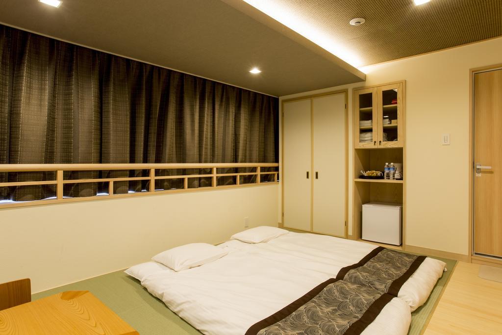 東心斎橋おおきにアパート Ookini Ryokan & Apartment โอซาก้า ภายนอก รูปภาพ